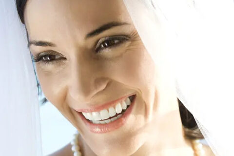 Women smiling with showing teeth